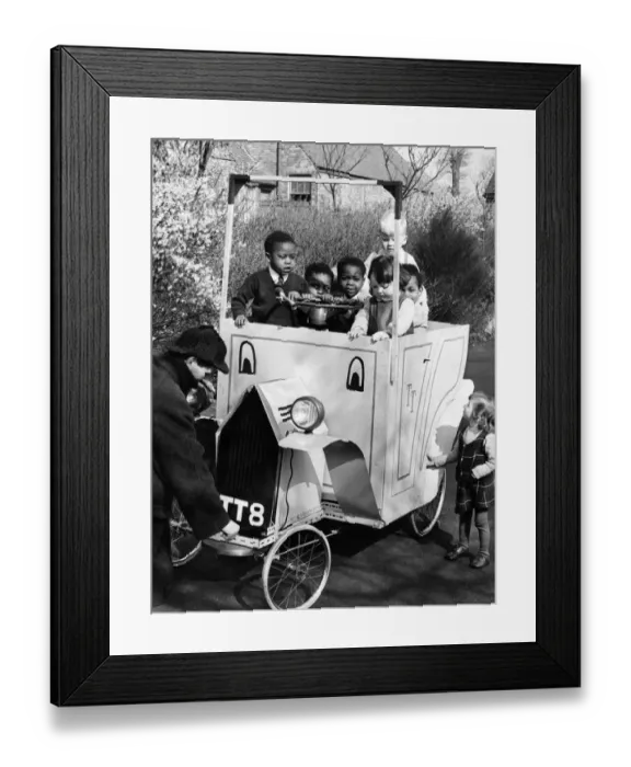 Framed Print : Children at Pype Hayes Hall Childrens home take delivery of their new electric car Framed Print : Children at Pype Hayes Hall Childrens home take delivery of their new electric car