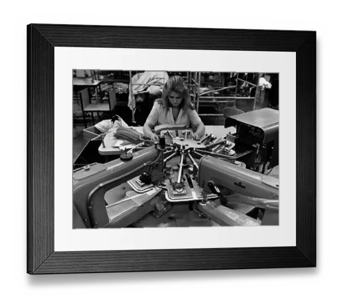 Framed Print : Cuff are sewn and trimmed automatically, at Dewhirst Shirt Factory, Dormanstown
