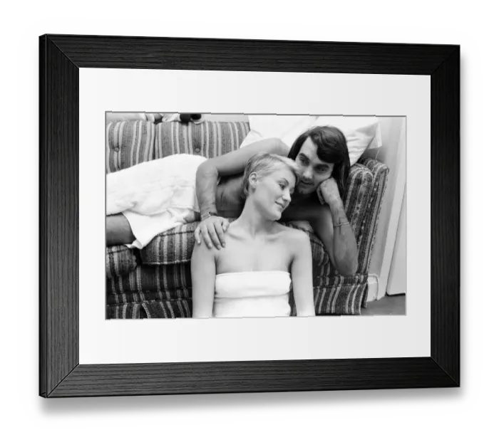 Framed Print : George Best and his girlfriend Angela Macdonald - James pictured at the London home of George Best. Angela later married George to become Angie Best. Picture taken 23rd September 1976George Best and his girlfriend Angela Macdonald - Janes