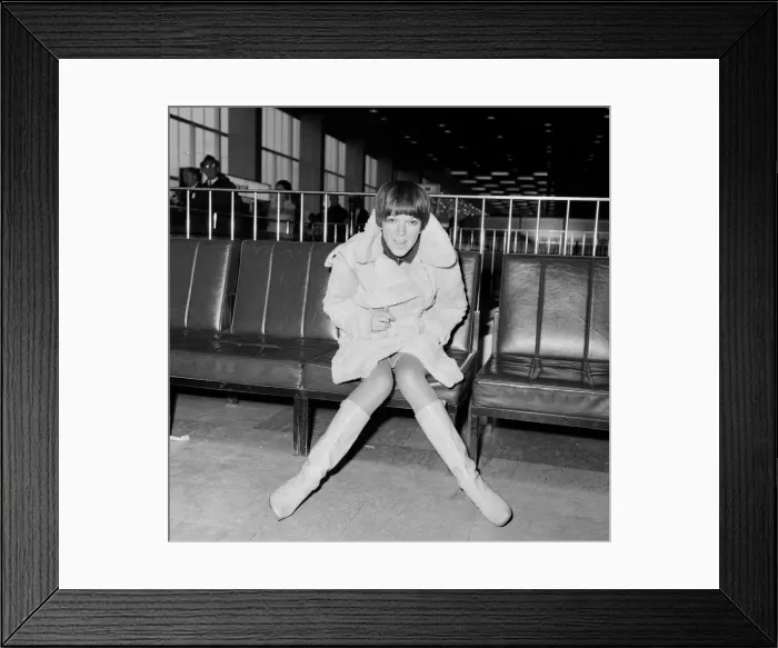 Framed Print : Mary Quant, at London Airport, on her way to Paris to go to a fancy dress ball Framed Print : Mary Quant, at London Airport, on her way to Paris to go to a fancy dress ball