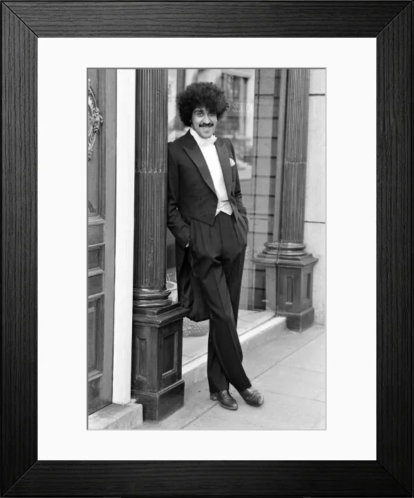 Framed Print : Phil Lynott of Thin Lizzy modelling clothes from Saville Row, London Framed Print : Phil Lynott of Thin Lizzy modelling clothes from Saville Row, London