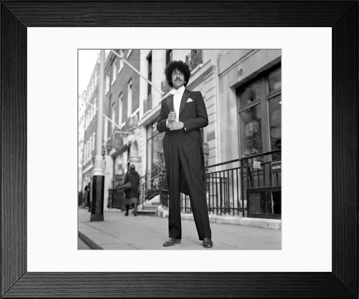 Framed Print : Phil Lynott of Thin Lizzy modelling clothes from Saville Row, London Framed Print : Phil Lynott of Thin Lizzy modelling clothes from Saville Row, London