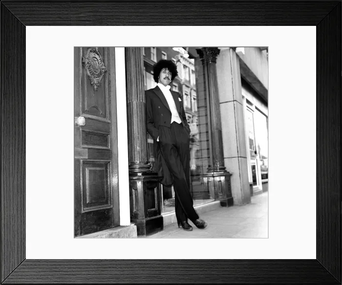 Framed Print : Phil Lynott of Thin Lizzy modelling clothes from Saville Row, London
