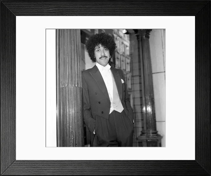 Framed Print : Phil Lynott of Thin Lizzy modelling clothes from Saville Row, London Framed Print : Phil Lynott of Thin Lizzy modelling clothes from Saville Row, London