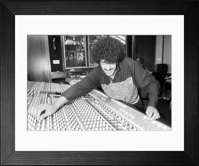 Framed Print : Phil Lynott of Thin Lizzy during a recording session for the groups new album Framed Print : Phil Lynott of Thin Lizzy during a recording session for the groups new album