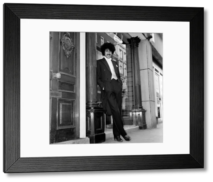 Framed Print : Phil Lynott of Thin Lizzy modelling clothes from Saville Row, London Framed Print : Phil Lynott of Thin Lizzy modelling clothes from Saville Row, London