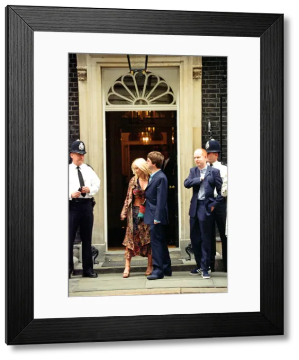 Framed Print : Noel Gallagher and his girlfriend Meg Matthews at 10 Downing Street for a party held by