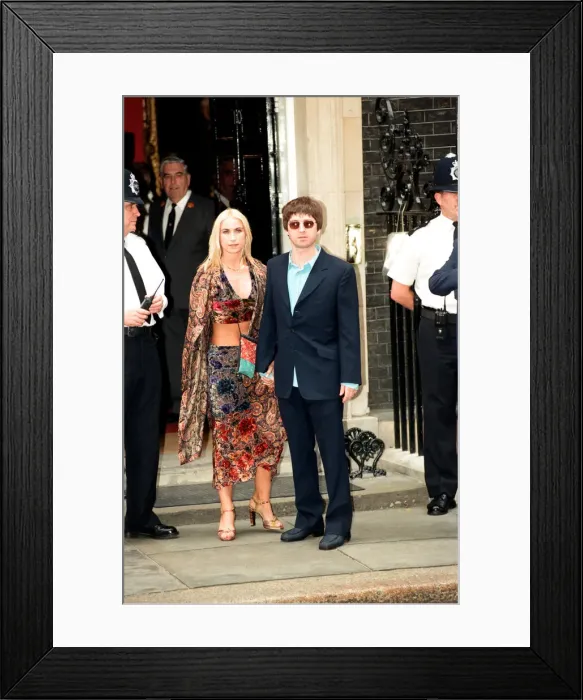 Framed Print : Noel Gallagher and his girlfriend Meg Matthews at 10 Downing Street for a party held by