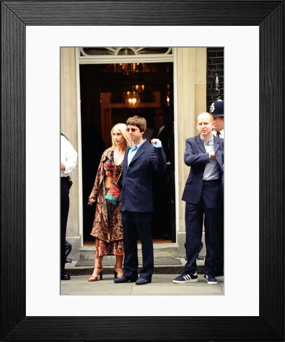 Framed Print : Noel Gallagher and his girlfriend Meg Matthews at 10 Downing Street for a party held by Framed Print : Noel Gallagher and his girlfriend Meg Matthews at 10 Downing Street for a party held by