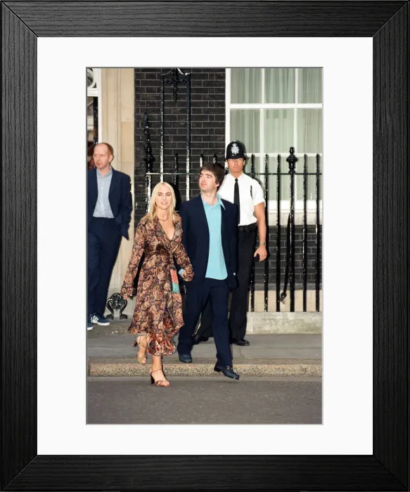 Framed Print : Noel Gallagher and his girlfriend Meg Matthews at 10 Downing Street for a party held by