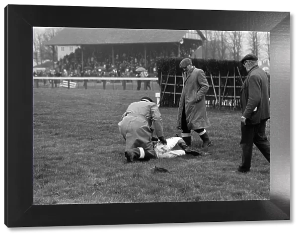 Horse racing at Windsor, a jockey who has fallen from his horse. 4th January 1972