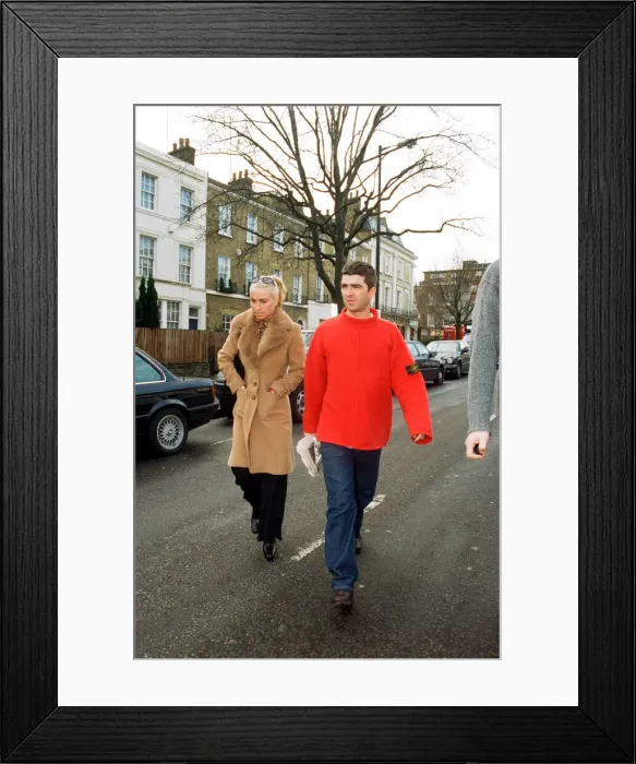 Framed Print : Noel Gallagher, from the pop / rock group Oasis, and his girlfriend Meg Matthews seen Framed Print : Noel Gallagher, from the pop / rock group Oasis, and his girlfriend Meg Matthews seen
