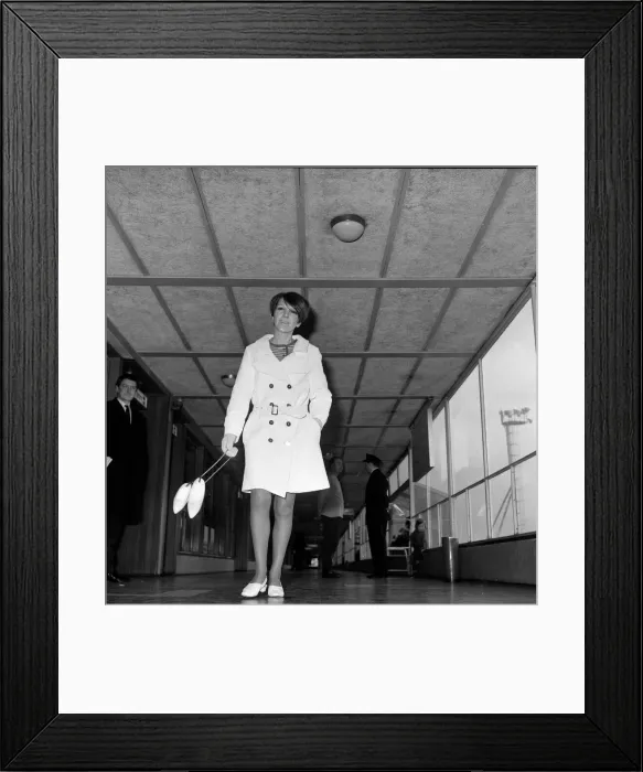 Framed Print : Mary Quant at London Heathrow Airport on her way to Copenhagen, wearing a short coat Framed Print : Mary Quant at London Heathrow Airport on her way to Copenhagen, wearing a short coat