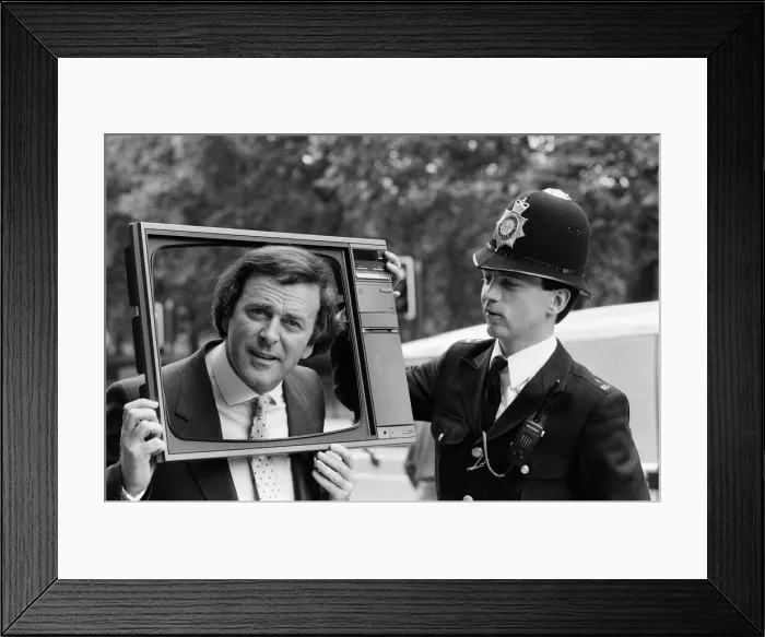 Framed Print : Terry Wogan was given 100 new TV sets today. They are being presented by Phillips the TV Framed Print : Terry Wogan was given 100 new TV sets today. They are being presented by Phillips the TV