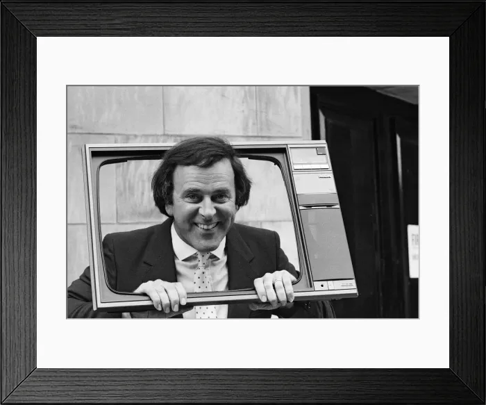 Framed Print : Terry Wogan was given 100 new TV sets today. They are being presented by Phillips the TV Framed Print : Terry Wogan was given 100 new TV sets today. They are being presented by Phillips the TV