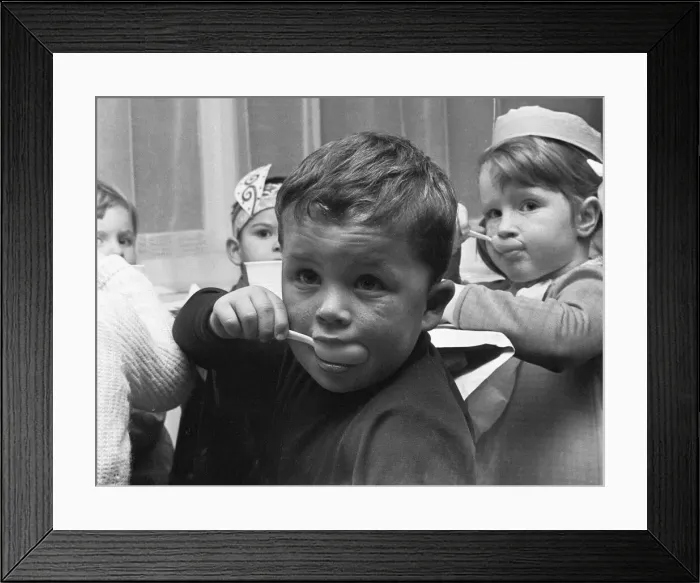 Framed Print : A small boy enjoying his jelly and ice cream during the Birch Copse School Christmas Framed Print : A small boy enjoying his jelly and ice cream during the Birch Copse School Christmas