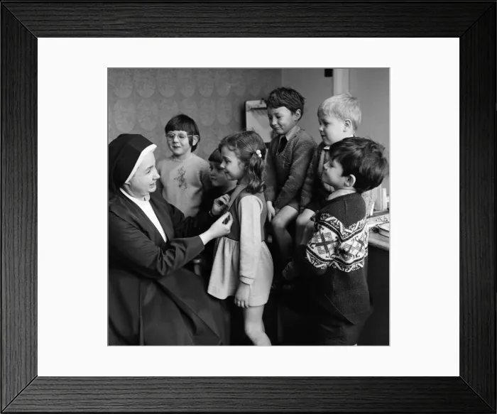 Framed Print : Children at Sacred Heart School, having a shamrock pined to them. 17th March 1971