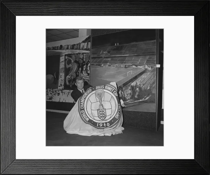 Framed Print : Bobby Moore football captain of England poses with the 1966 World Cup flag 25  /  3  /  66