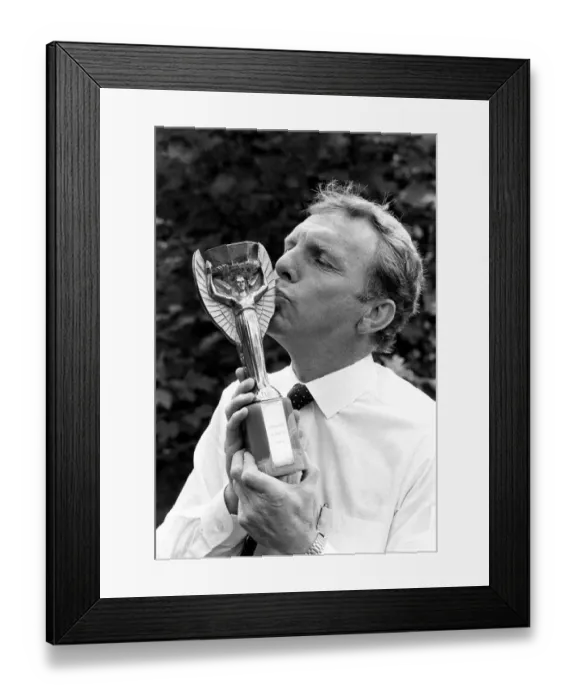 Framed Print : Bobby Moore West Ham and England Footballer kisses the the old Jules Rimet World Cup Framed Print : Bobby Moore West Ham and England Footballer kisses the the old Jules Rimet World Cup