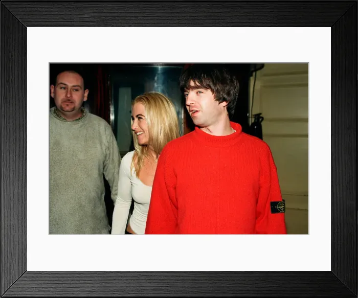 Framed Print : Noel Gallagher, from the pop / rock group Oasis, and his girlfriend Meg Matthews seen at an Framed Print : Noel Gallagher, from the pop / rock group Oasis, and his girlfriend Meg Matthews seen at an