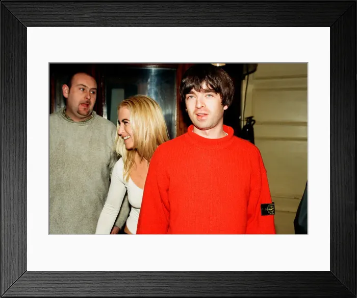 Framed Print : Noel Gallagher, from the pop / rock group Oasis, and his girlfriend Meg Matthews seen at an Framed Print : Noel Gallagher, from the pop / rock group Oasis, and his girlfriend Meg Matthews seen at an