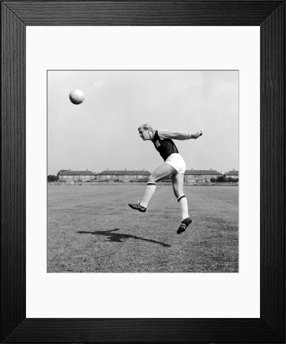 Framed Print : England player Bobby Moore August 1962 in action West ham United Training