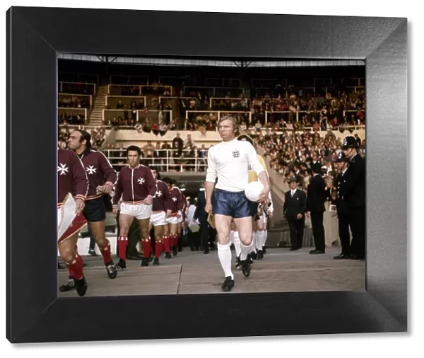 England v Malta, Wembley Stadium, 10. 05. 71. England captain Bobby Moore leads