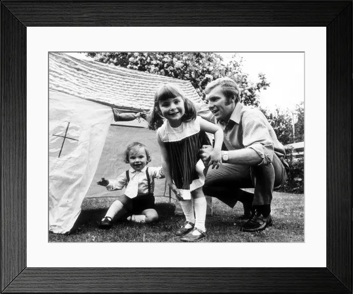 Framed Print : West Ham and England footballer Bobby Moore with his children Roberta and Dean Framed Print : West Ham and England footballer Bobby Moore with his children Roberta and Dean