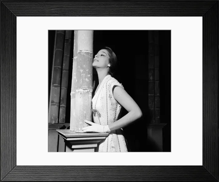 Framed Print : An Italian model, wearing clothes by Italian designers, during rehearsals for a Framed Print : An Italian model, wearing clothes by Italian designers, during rehearsals for a