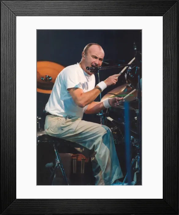 Framed Print : Singer Phil Collins performs in concert at Newcastle Arena 9 November 1997