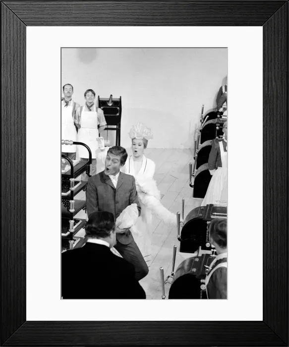 Framed Print : Dick Van Dyke and Sally Ann Howes (behind) filming a scene for Chitty Chitty Bang Bang Framed Print : Dick Van Dyke and Sally Ann Howes (behind) filming a scene for Chitty Chitty Bang Bang