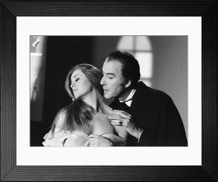 Framed Print : Christopher Lee, being photographed for poster, dressed as character Dracula in film