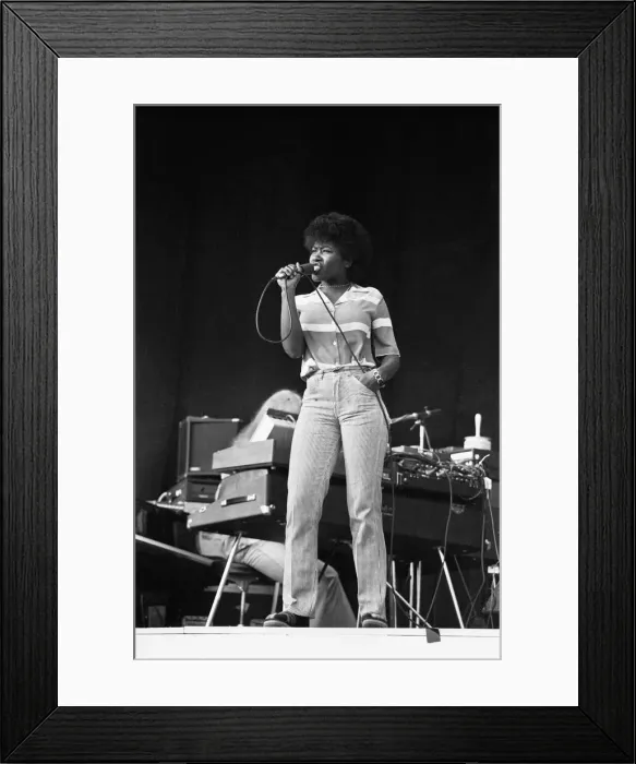 Framed Print : Joan Armatrading seen here performing on stage at The Picnic concert at Blackbushe Framed Print : Joan Armatrading seen here performing on stage at The Picnic concert at Blackbushe
