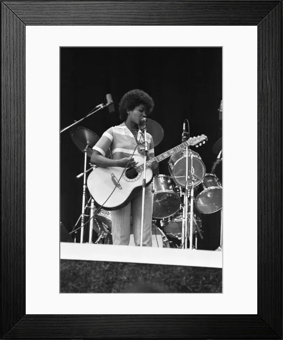Framed Print : Joan Armatrading seen here performing on stage at The Picnic concert at Blackbushe Framed Print : Joan Armatrading seen here performing on stage at The Picnic concert at Blackbushe