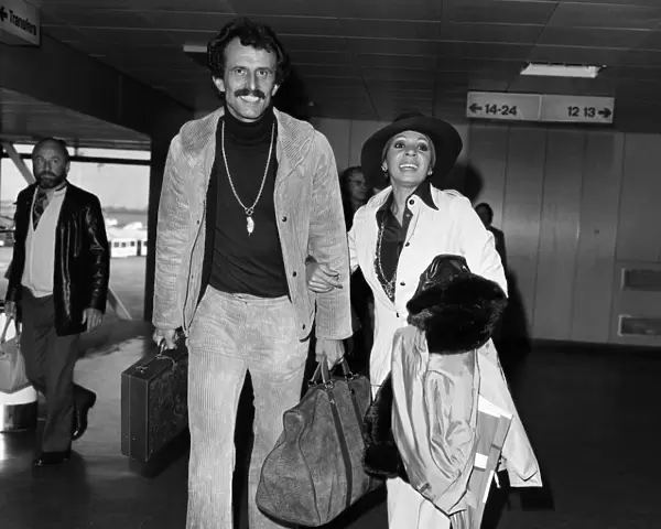 Singer Shirley Bassey and husband Sergio Novak arrive at London Airport from Switzerland