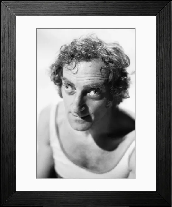 Framed Print : Comedian Marty Feldman poses for Mirror cameraman Ron Burton after his interview with