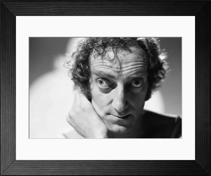Framed Print : Comedian Marty Feldman poses for Mirror cameraman Ron Burton after his interview with