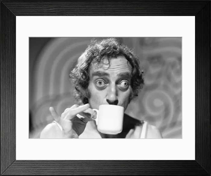 Framed Print : Comedian Marty Feldman poses for Mirror cameraman Ron Burton after his interview with