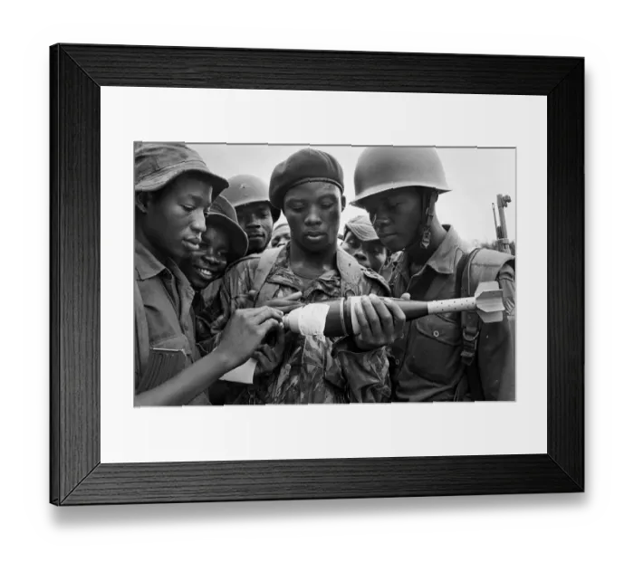 Framed Print : Biafran soldiers seen here inspecting a bomb during the Biafran conflict, 11th June 1968 Framed Print : Biafran soldiers seen here inspecting a bomb during the Biafran conflict, 11th June 1968