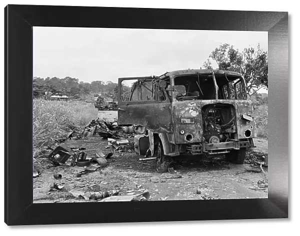 Wreckage of a Nigerian convoy on the roadside during the Biafra conflict, 11th June 1968