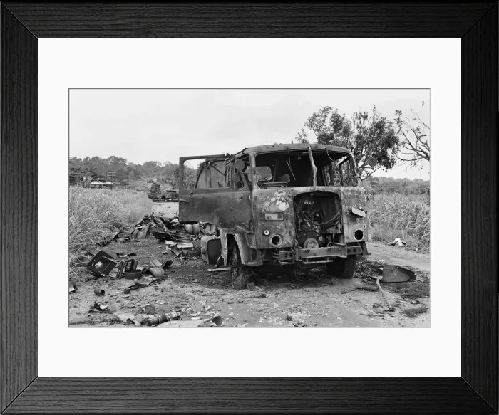 Framed Print : Wreckage of a Nigerian convoy on the roadside during the Biafra conflict, 11th June 1968 Framed Print : Wreckage of a Nigerian convoy on the roadside during the Biafra conflict, 11th June 1968