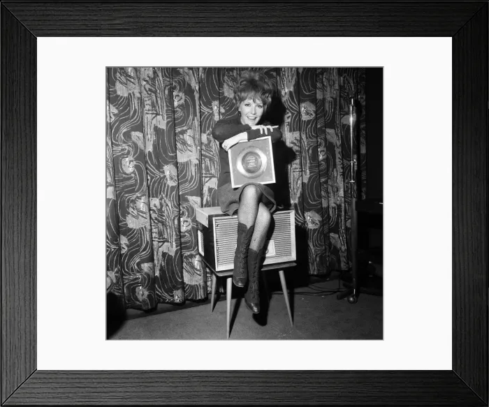 Framed Print : Petula Clark gets a golden disc for Downtown, her record which sold a million Framed Print : Petula Clark gets a golden disc for Downtown, her record which sold a million