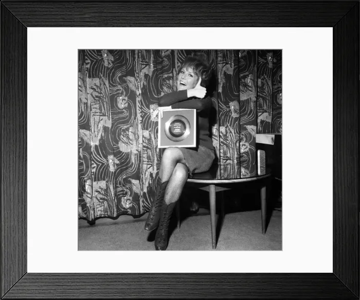 Framed Print : Petula Clark gets a golden disc for Downtown, her record which sold a million Framed Print : Petula Clark gets a golden disc for Downtown, her record which sold a million