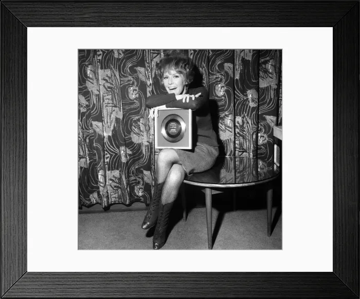 Framed Print : Petula Clark gets a golden disc for Downtown, her record which sold a million Framed Print : Petula Clark gets a golden disc for Downtown, her record which sold a million