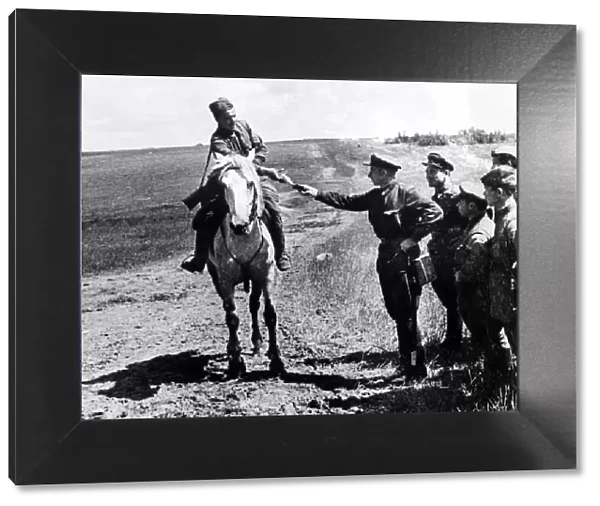 Red Army dispatch rider on the Western Front. A Red Army man delivers a dispatch to his