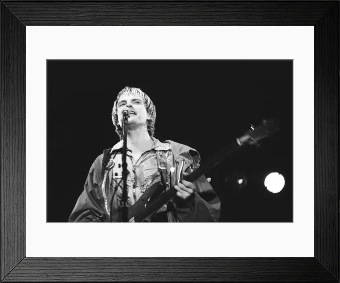 Framed Print : Sting, lead singer of The Police, seen here performing on the first night of the 1979