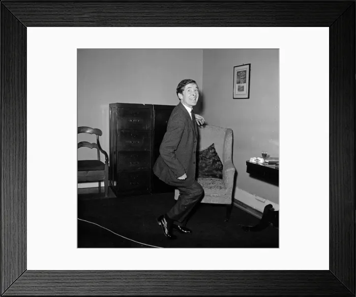 Framed Print : Kenneth Williams pictured in his agents office in Cork Street, London Framed Print : Kenneth Williams pictured in his agents office in Cork Street, London