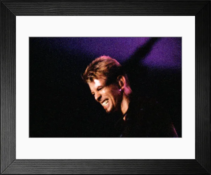 Framed Print : Pop star David Bowie performing on stage during a concert at The Barrowlands in Glasgow Framed Print : Pop star David Bowie performing on stage during a concert at The Barrowlands in Glasgow