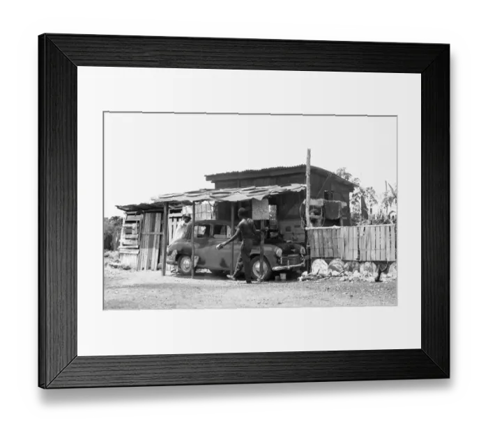 Framed Print : A Morris Oxford undergoing repairs at a auto repair garage off the Spanish Town Road Framed Print : A Morris Oxford undergoing repairs at a auto repair garage off the Spanish Town Road