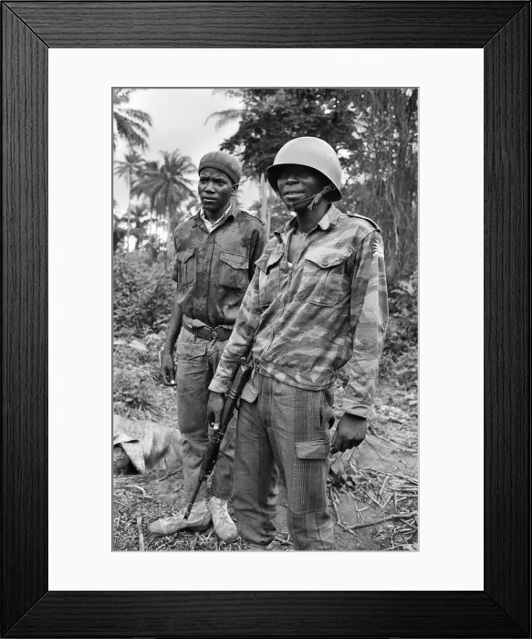 Framed Print : A Biafran soldier seen here in relaxed mood, armed with an AK47 semi automatic rifle Framed Print : A Biafran soldier seen here in relaxed mood, armed with an AK47 semi automatic rifle